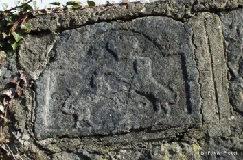 Carving of unicorn and lion standing on their hindlegs at Thurles Pillar Stone
